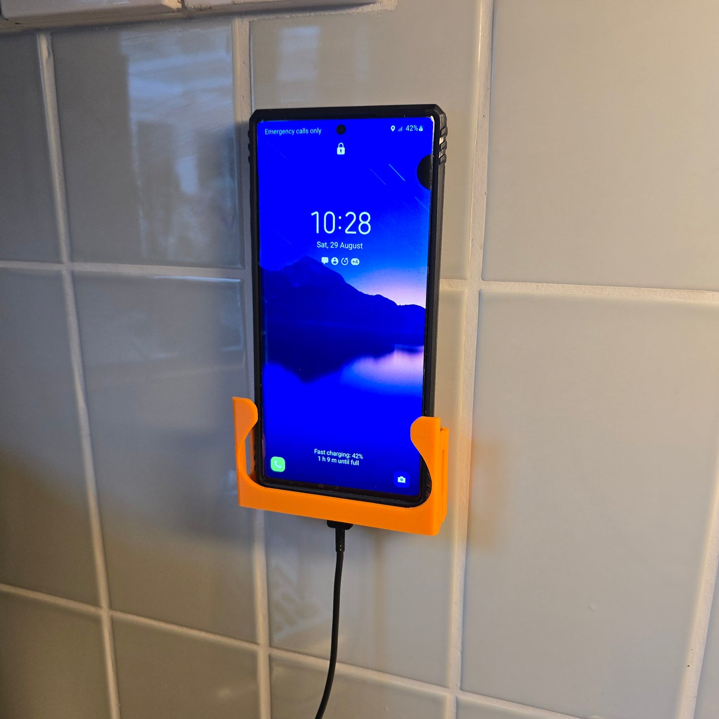FlexDock-V2™ Self-Adhesive Wall Phone Holder – Universal Mobile Dock  with charging port access | Made in UK by Creowaves